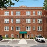 a car parked in front of a building
