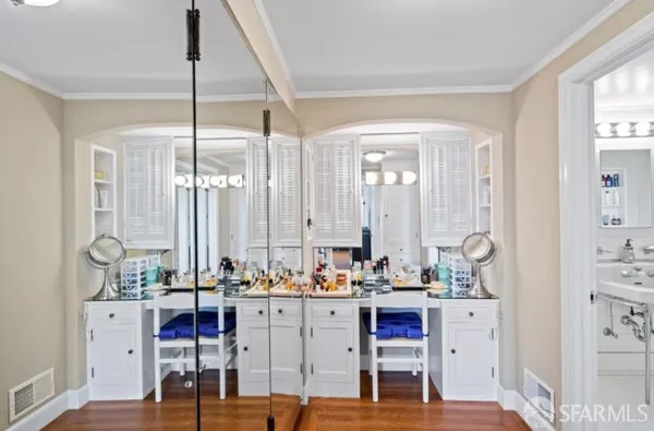 a view of dining room and kitchen with windows