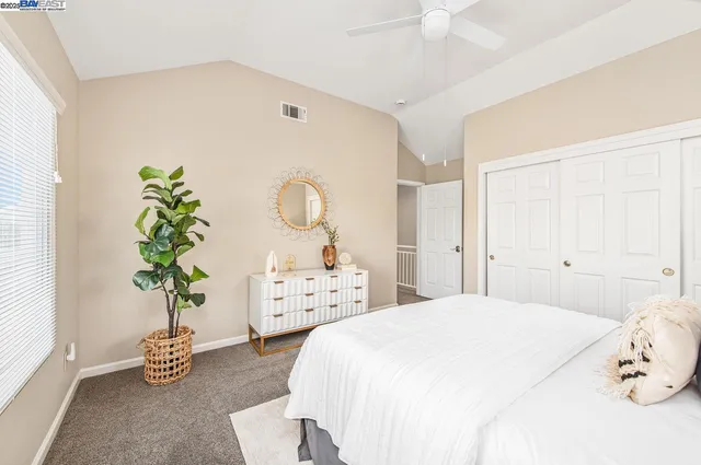 a view of a chairs and table in the balcony