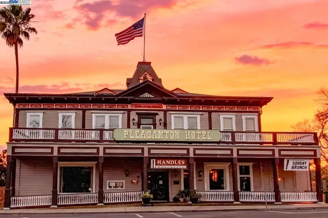 a street sign on a pole on a street