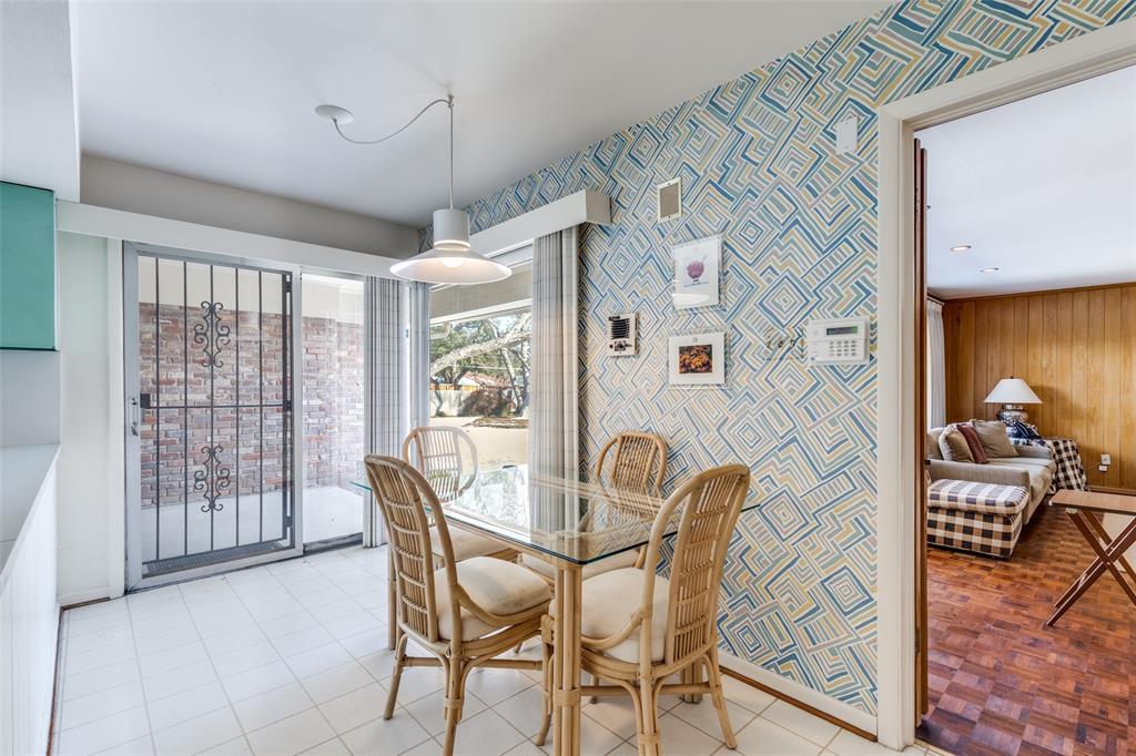 7215 Currin Drive Dallas, TX 75230 - Photo 15 of 35 a dining room with furniture and wooden floor