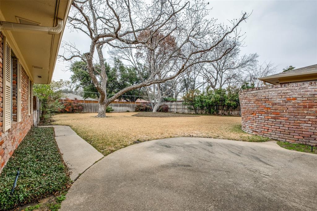 7215 Currin Drive Dallas, TX 75230 - Photo 32 of 35 a view of road with large trees