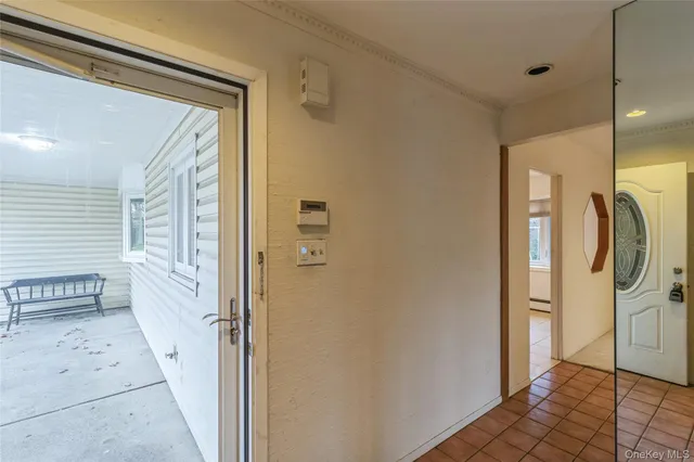 a bathroom with a shower and a sink