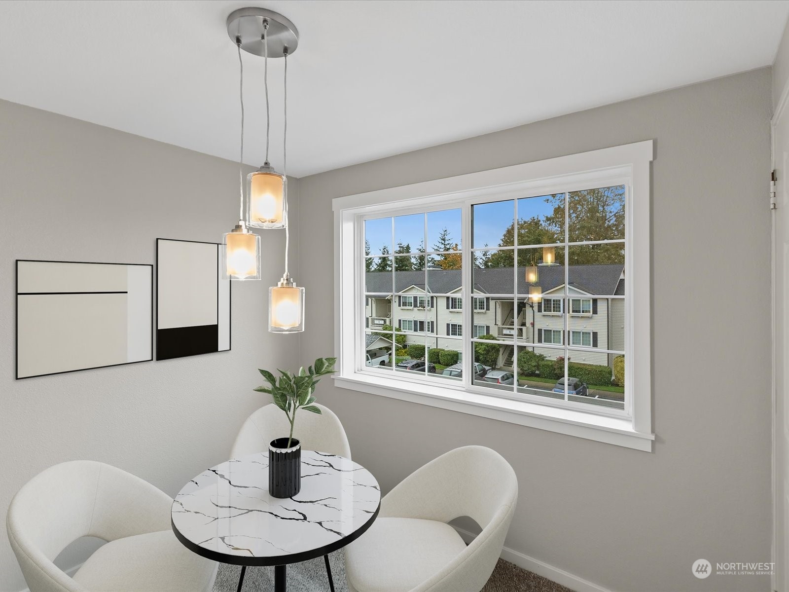 12404 East Gibson Road, Unit J303 Everett, WA 98204 - Photo 12 of 40 a dining room with furniture and window