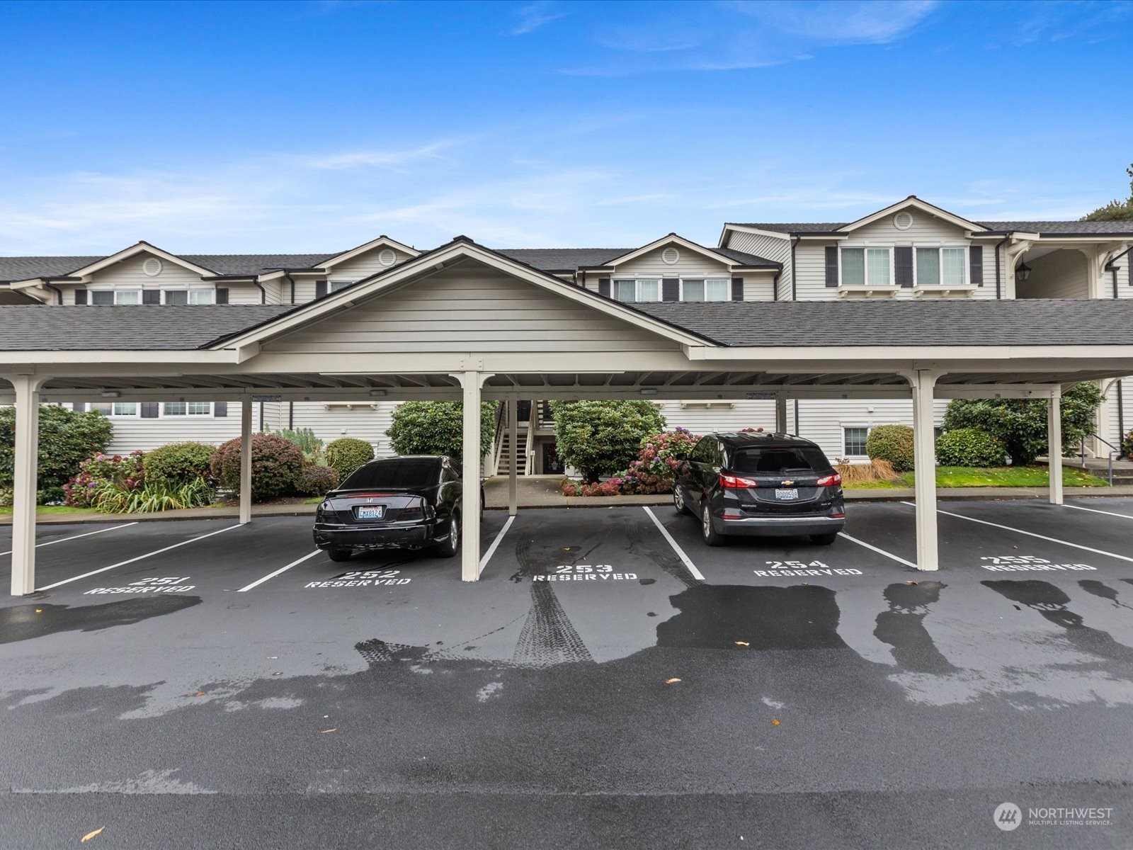 12404 East Gibson Road, Unit J303 Everett, WA 98204 - Photo 26 of 40 a car parked in front of a house