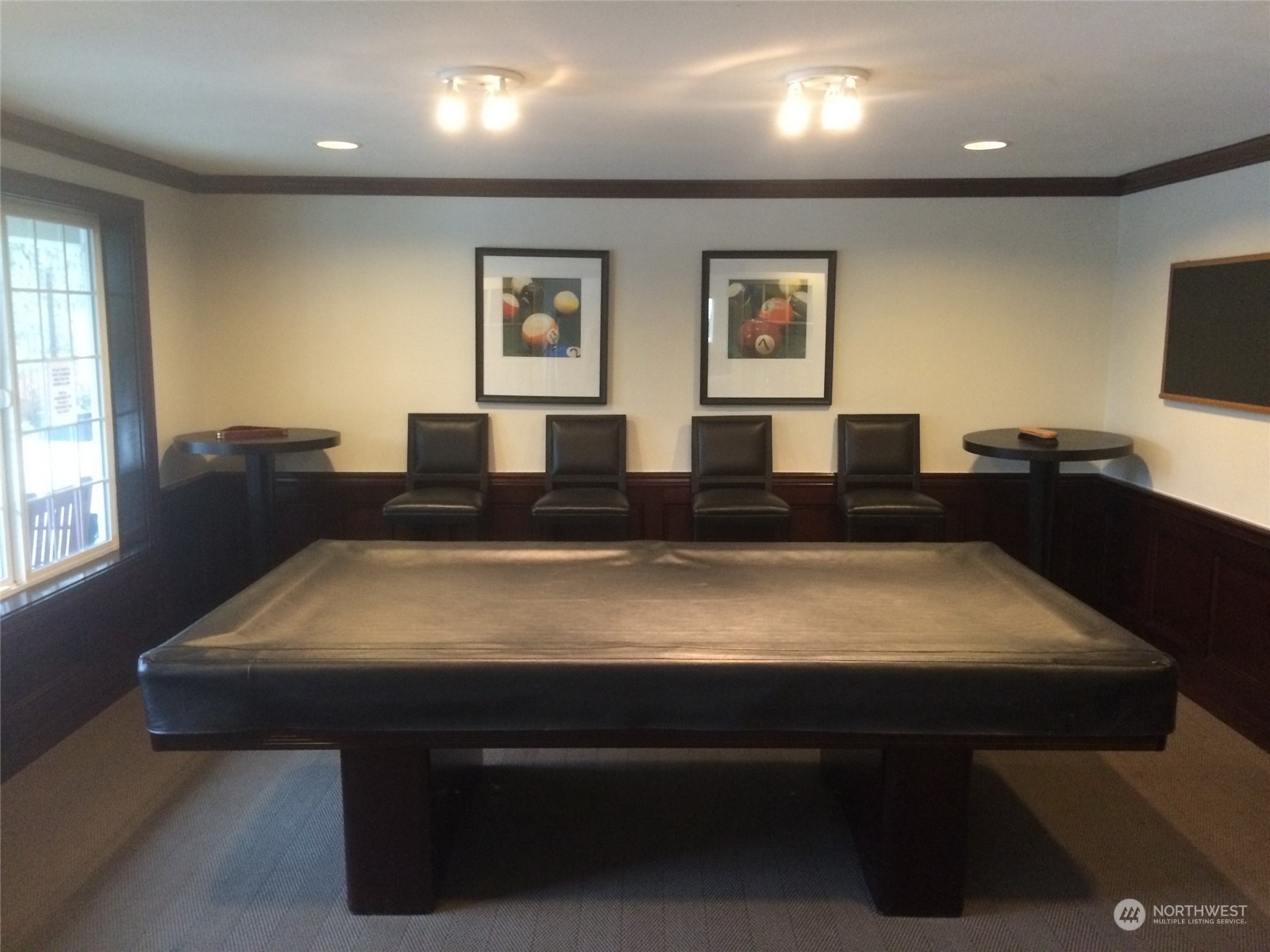 12404 East Gibson Road, Unit J303 Everett, WA 98204 - Photo 39 of 40 a large room with furniture and a flat screen tv