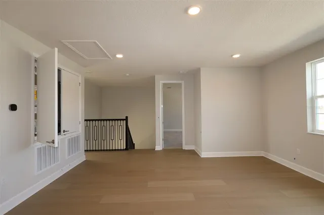 a picture of a wall with a white refrigerator