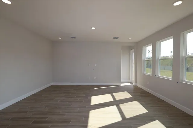 a bathroom with a shower and sink