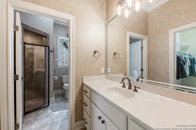 a front view of a house with a yard and outdoor seating