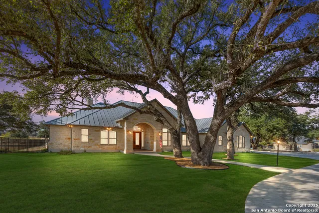 a view of entryway with furniture and wooden floor