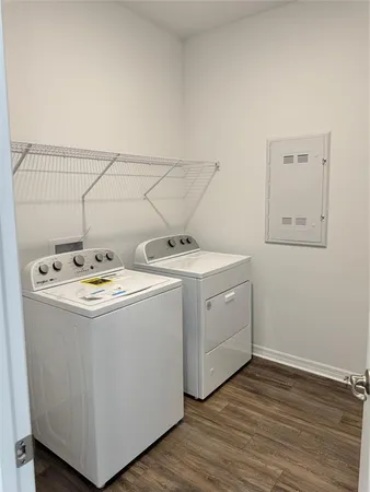 a utility room with washer and dryer