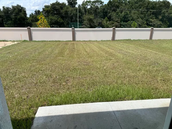 a view of outdoor space and yard
