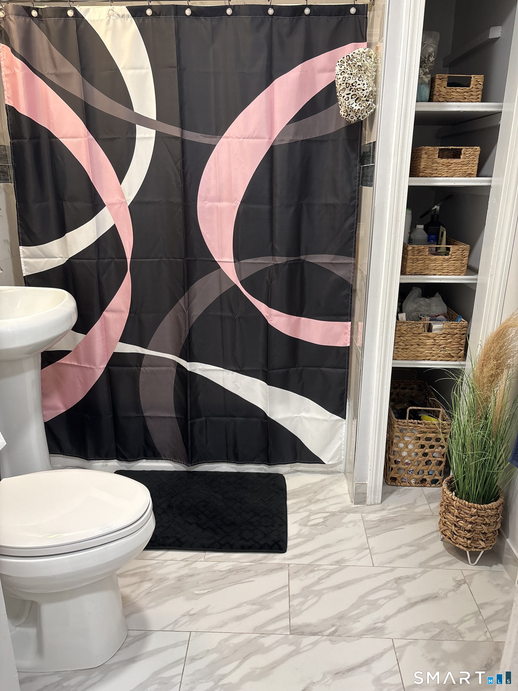 55 New Hanover Avenue Meriden, CT 06451 - Photo 12 of 33 a bathroom with a toilet and a rug