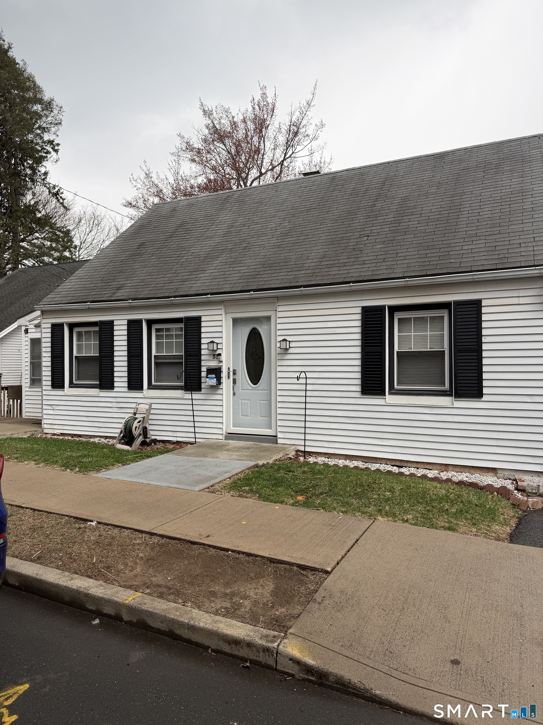 55 New Hanover Avenue Meriden, CT 06451 - Photo 32 of 33 a house that has a lot of windows in it