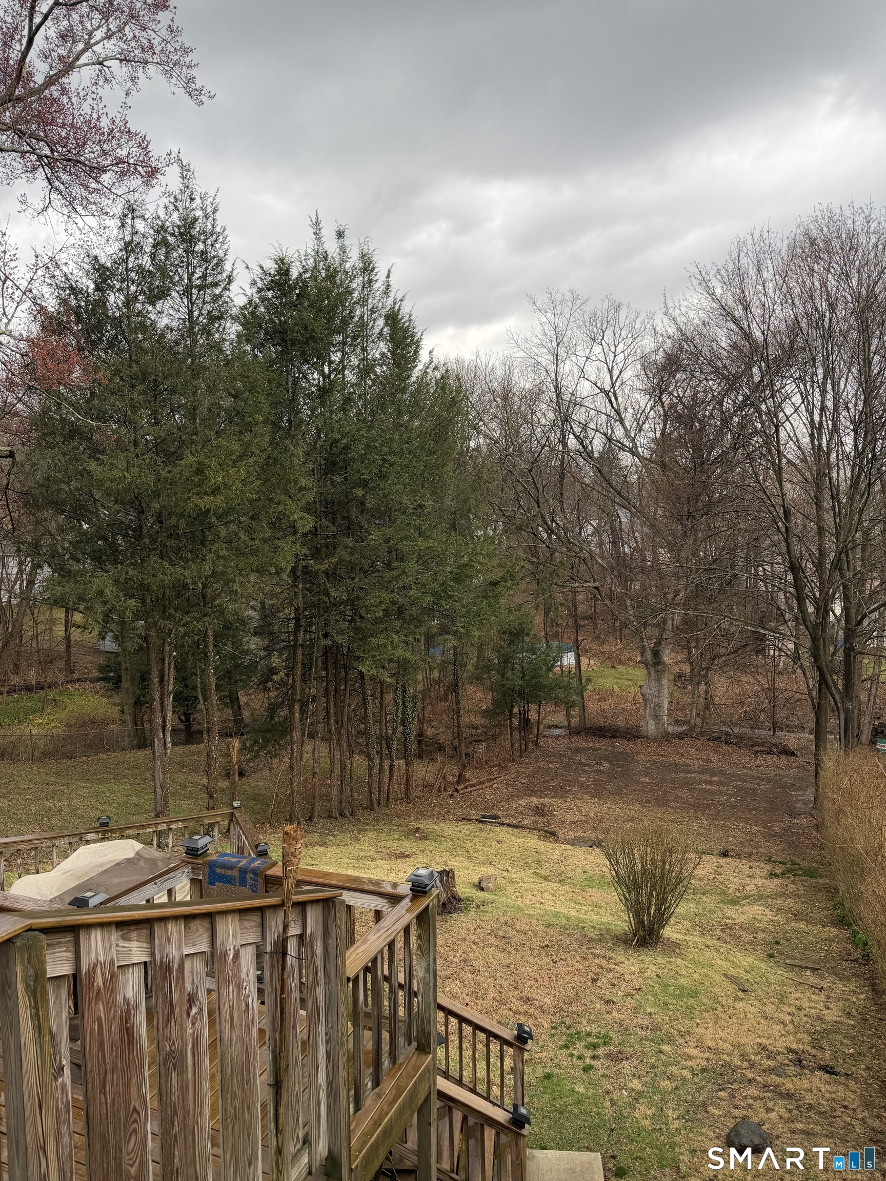55 New Hanover Avenue Meriden, CT 06451 - Photo 7 of 33 a view of a yard with wooden fence