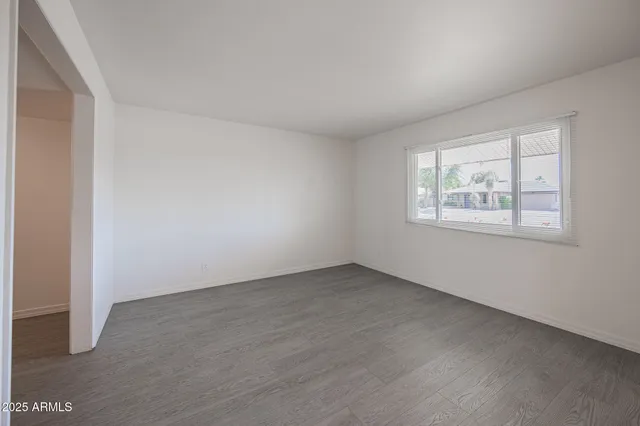 an empty room with windows