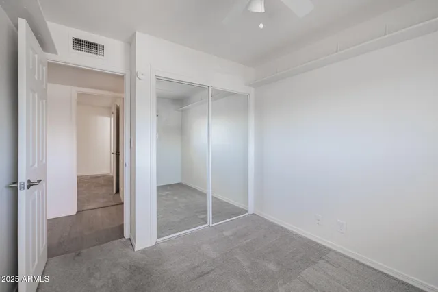 wooden floor and closet in a room