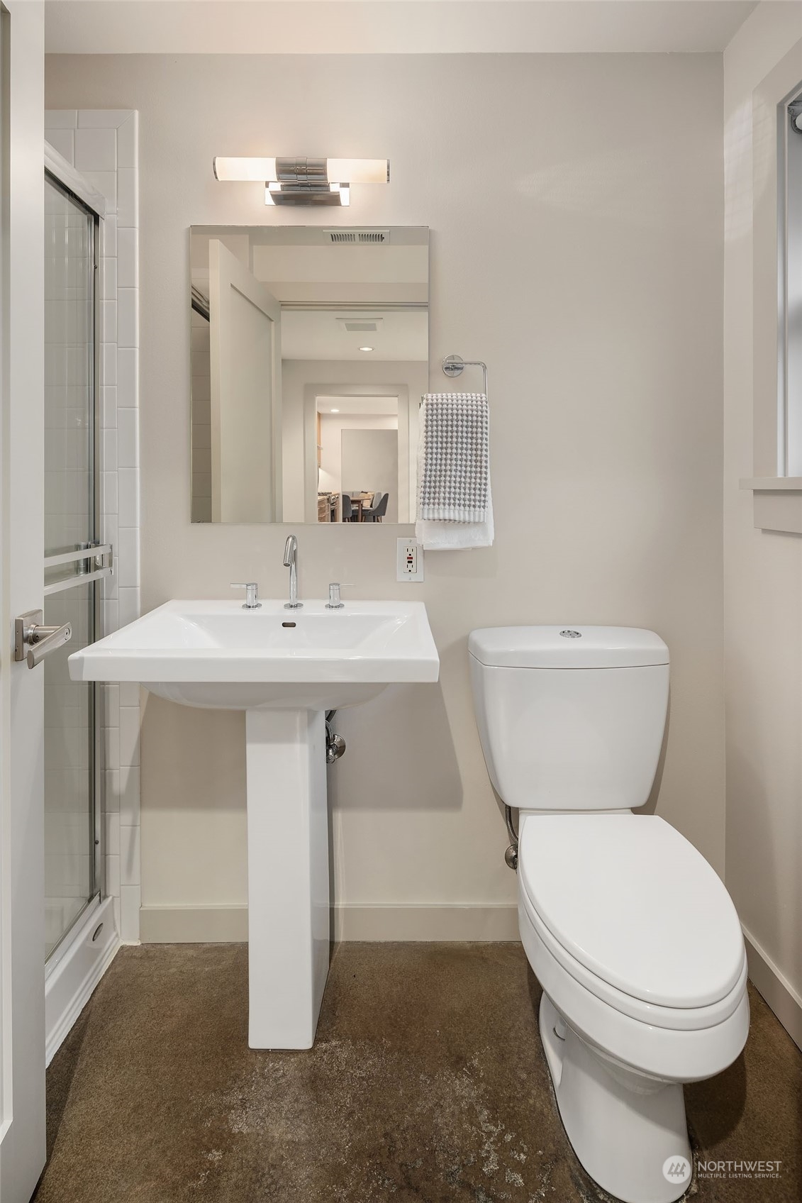 3001 Hunts Point Road Hunts Point, WA 98004 - Photo 17 of 33 a bathroom with a toilet sink and mirror