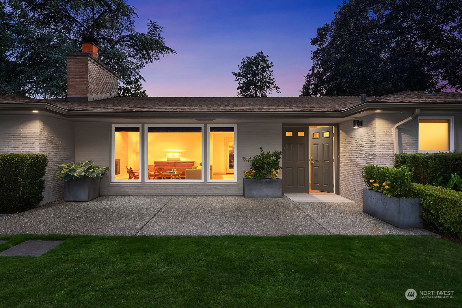 3001 Hunts Point Road Hunts Point, WA 98004 - Photo 2 of 33 a view of a house with backyard and porch