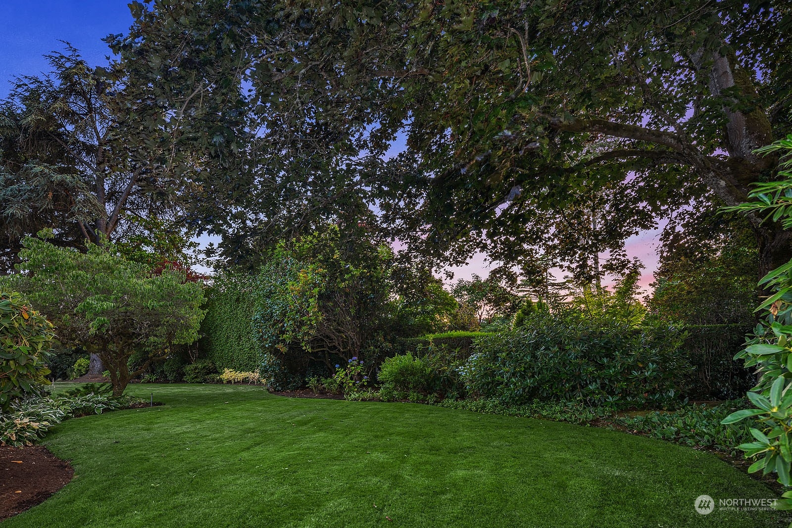 3001 Hunts Point Road Hunts Point, WA 98004 - Photo 33 of 33 a view of a green field with plants