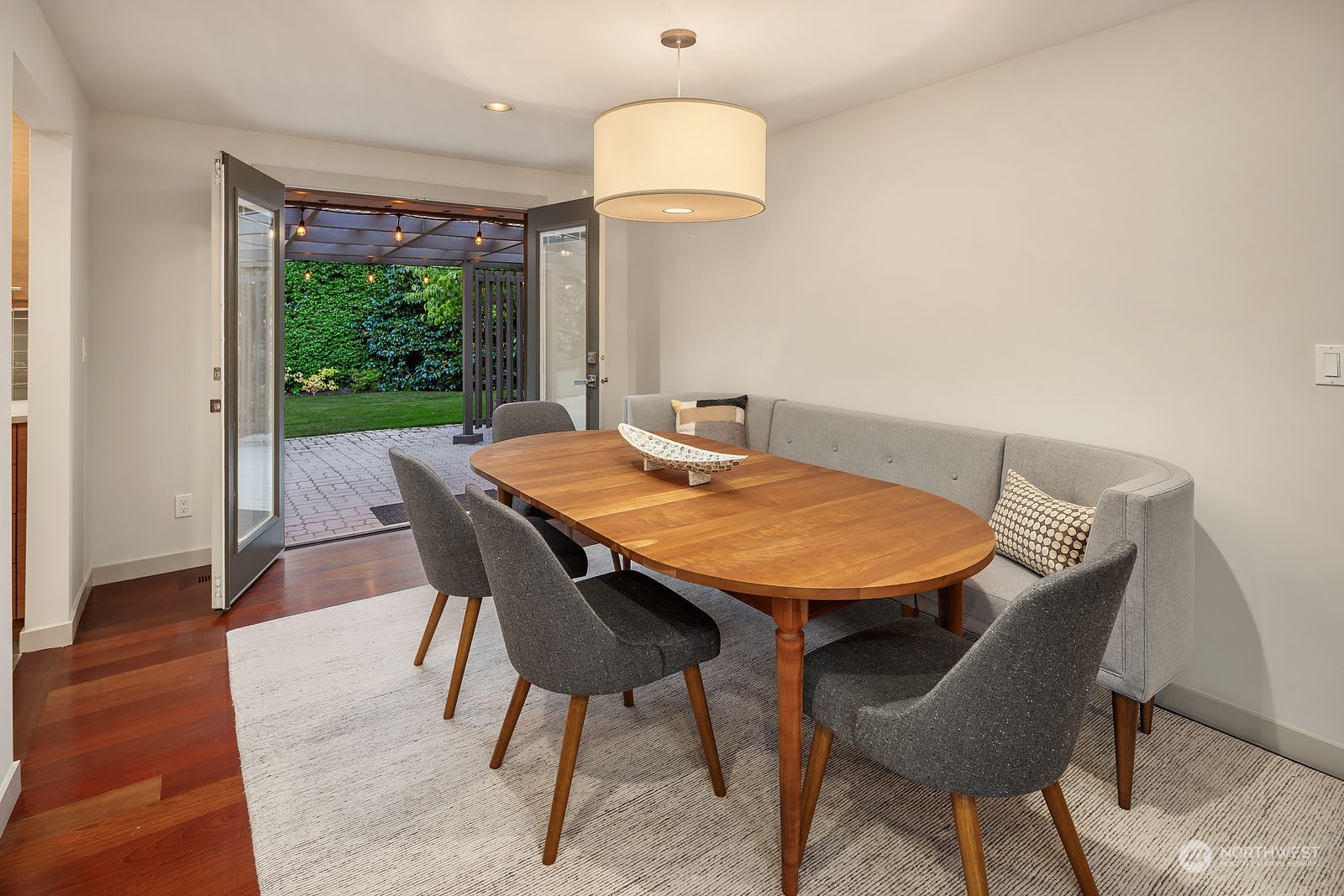 3001 Hunts Point Road Hunts Point, WA 98004 - Photo 10 of 33 a view of a dining room with furniture window and wooden floor