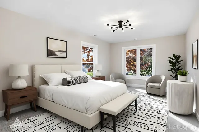 an empty room with windows and closet