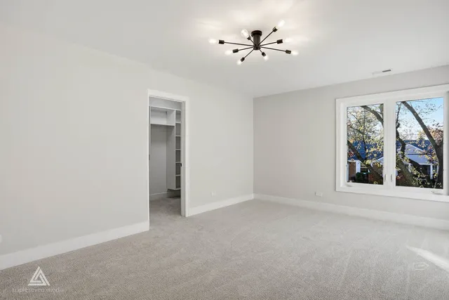 a bathroom with a double vanity sink toilet and shower