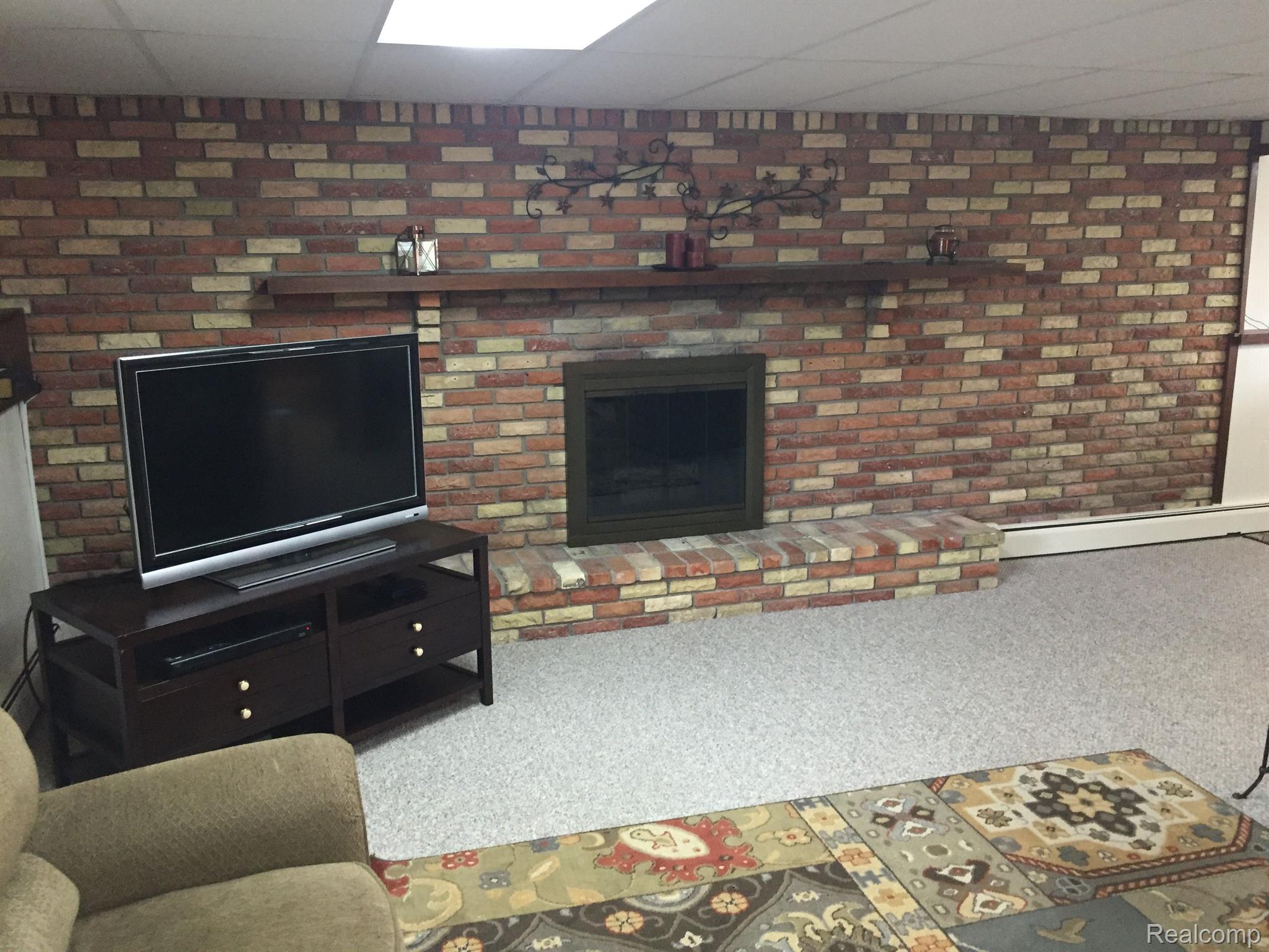 5657 Cribbins Road Avoca, MI 48006 - Photo 35 of 66 Brick Fireplace in Family Room