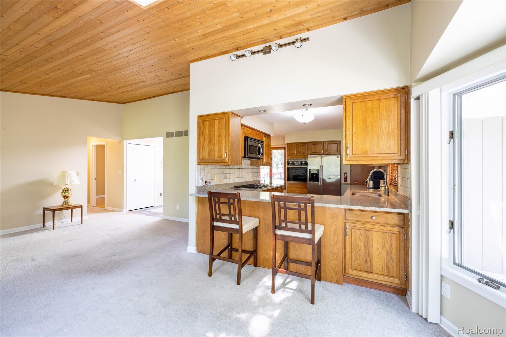 8653 Lake Road Grosse Ile, MI 48138 - Photo 8 of 34 8653 Lake Rd, Grosse Ile - Open Kitchen, Living, Dining Space