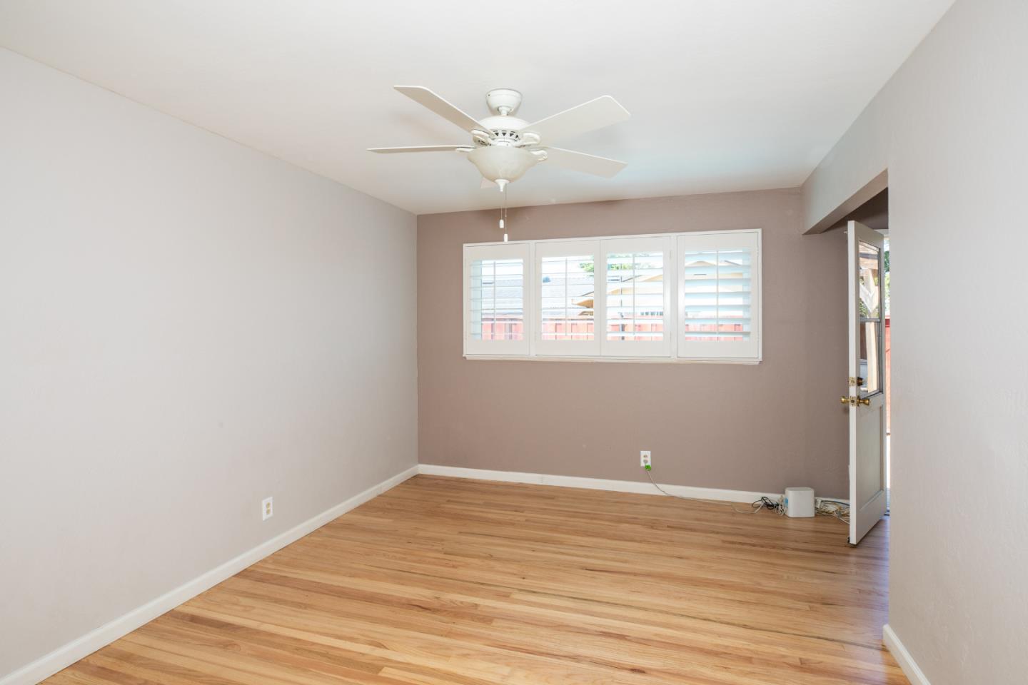 1937 Adelaide Way San Jose, CA 95124 - Photo 17 of 33 a view of a livingroom with wooden floor and a window