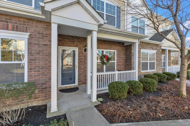 a view of a house with a small garden