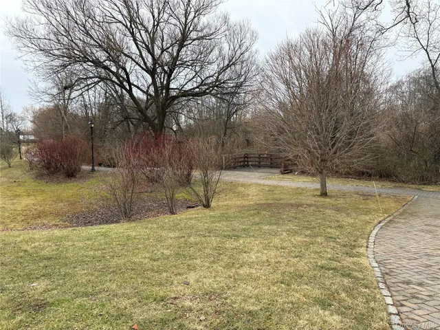 a view of a car park both side of building