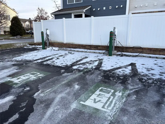 a view of a swimming pool with a lounge chair