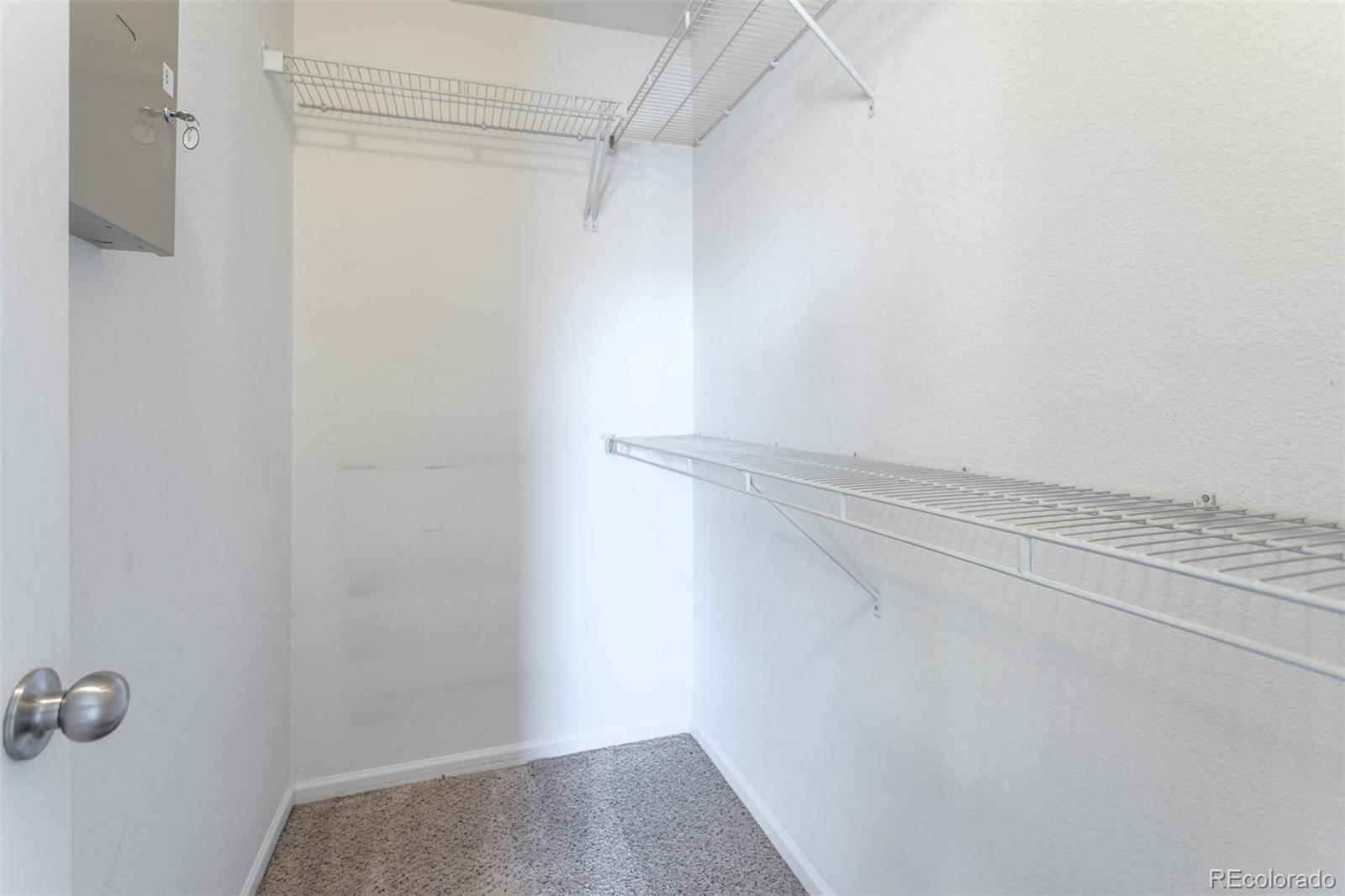 5559 Malta Street Denver, CO 80249 - Photo 12 of 27 a view of small space with racks on the wall