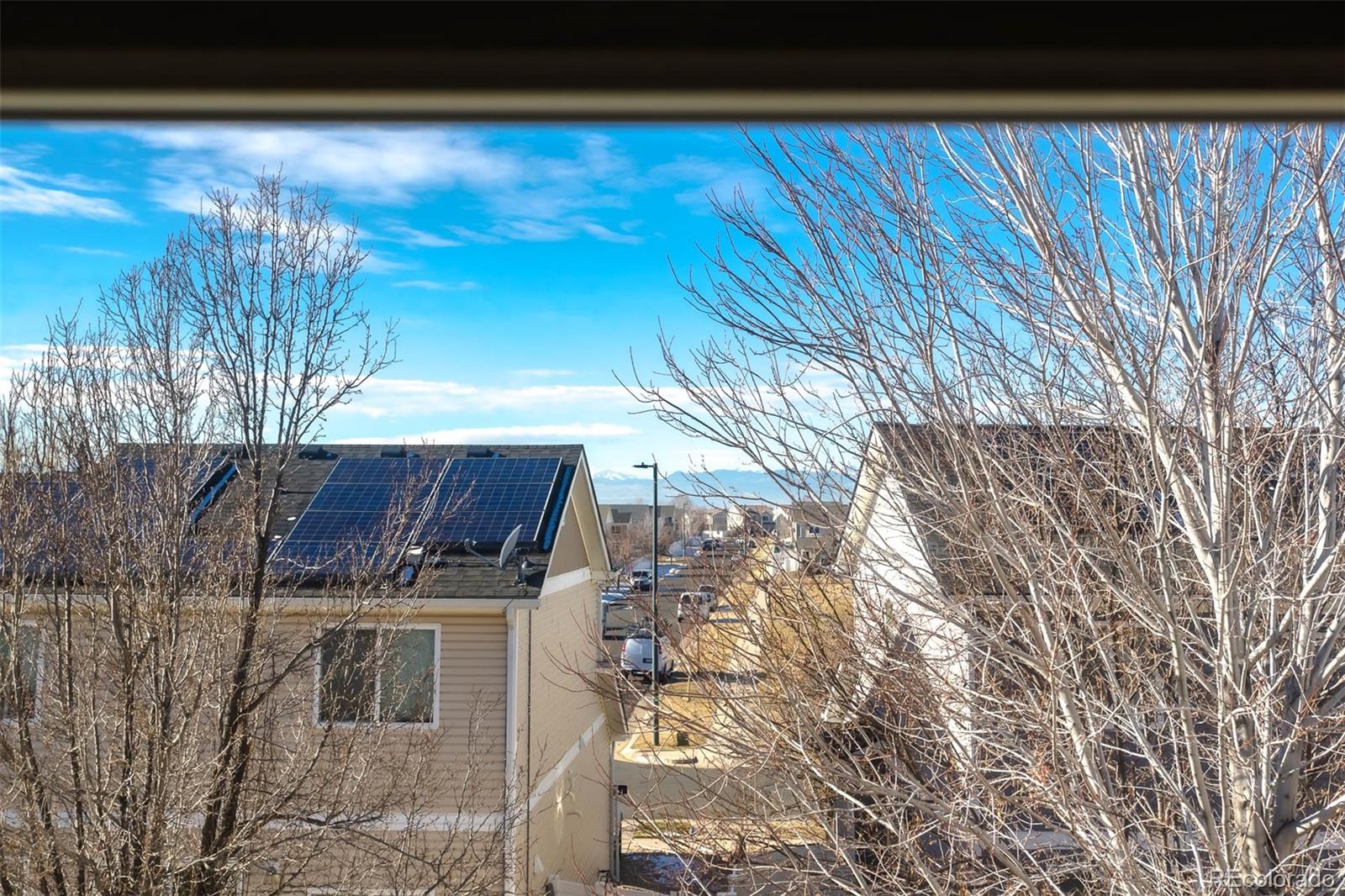 5559 Malta Street Denver, CO 80249 - Photo 18 of 27 a view of balcony with wooden floor