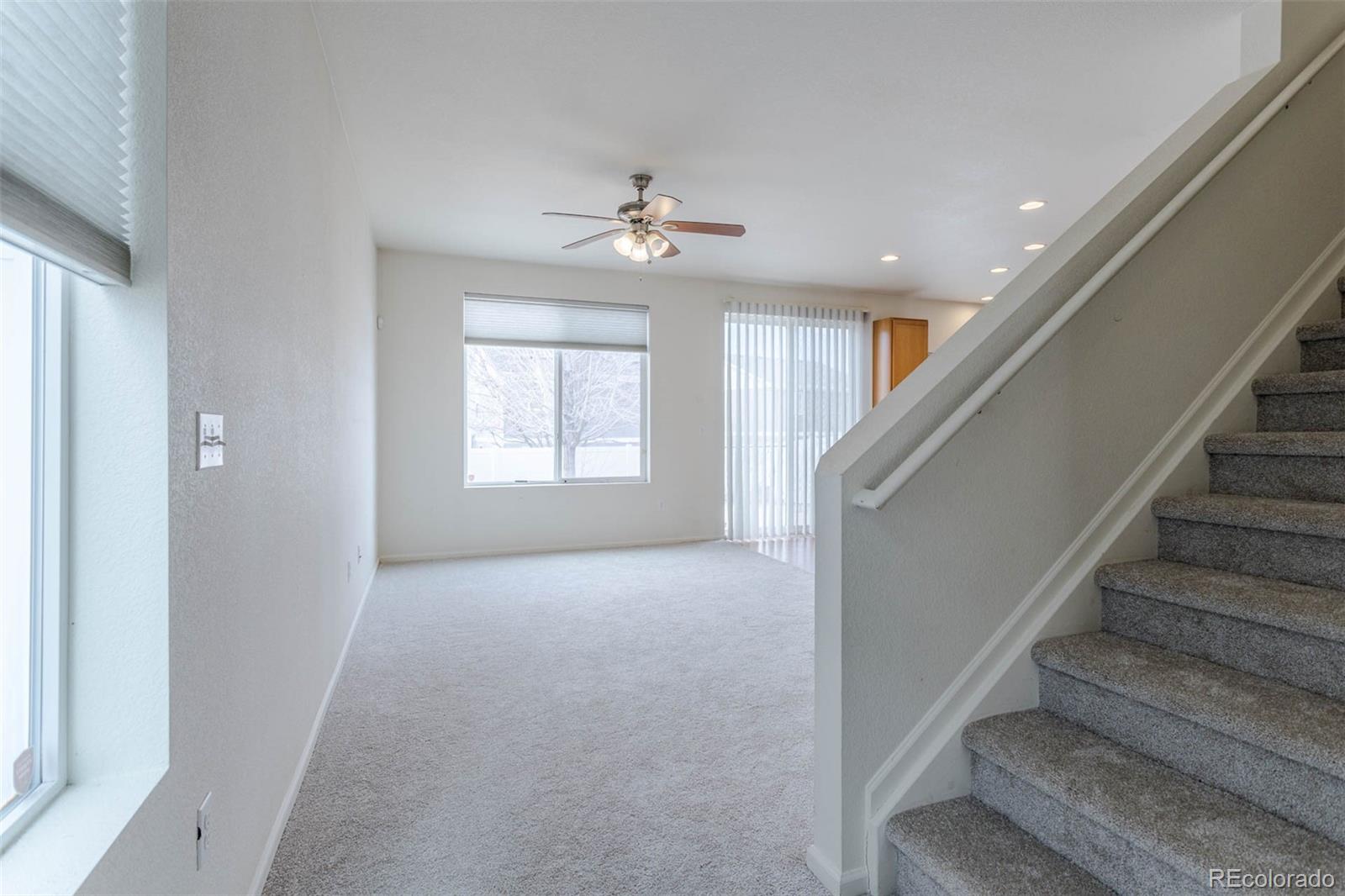 5559 Malta Street Denver, CO 80249 - Photo 3 of 27 a view of an empty room with a window