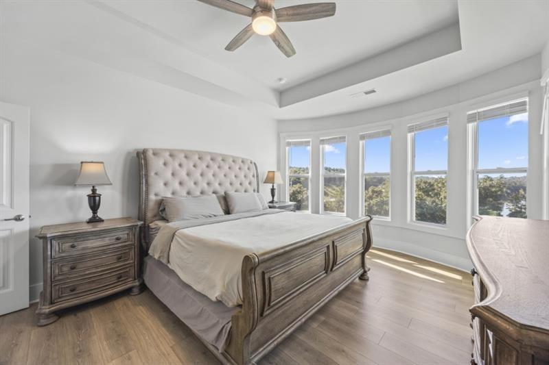 3431 Big View Road Gainesville, GA 30506 - Photo 17 of 59 a bedroom with a large bed and a large window