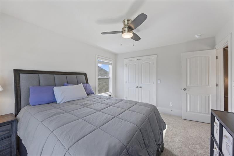 3431 Big View Road Gainesville, GA 30506 - Photo 28 of 59 a bedroom with a bed and painting on the wall