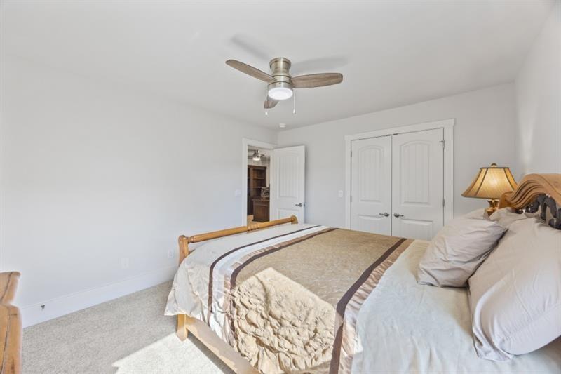 3431 Big View Road Gainesville, GA 30506 - Photo 31 of 59 a bedroom with a bed and window