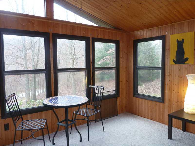 836 State Rt 30 Clinton, PA 15026 - Photo 11 of 21 Sunroom. Wow! Sunroom provides great space for extra guests, extra dining area, or just as your quiet spot to enjoy the scenery! Soon there will be snow on the pines!