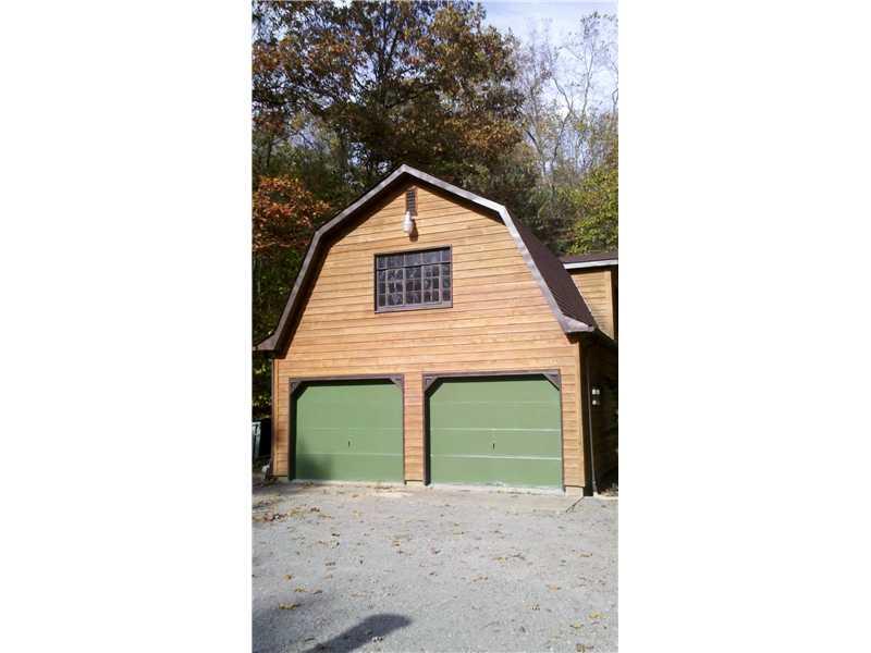 836 State Rt 30 Clinton, PA 15026 - Photo 18 of 21 Parking Lot/Garage. OK Guys! This is the garage of your dreams, plus upper level room for a "man cave" or work shop!