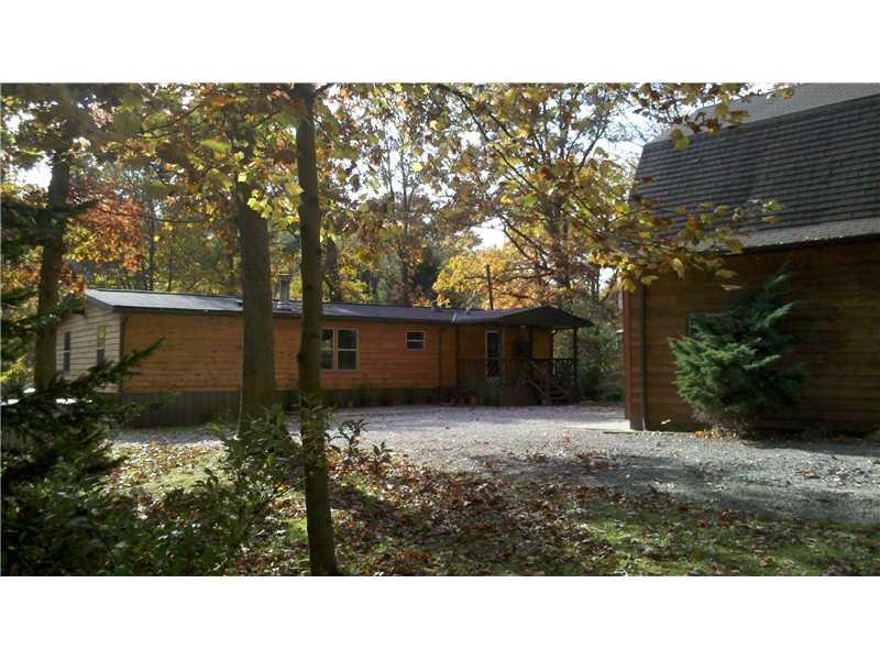 836 State Rt 30 Clinton, PA 15026 - Photo 3 of 21 Exterior Back. Great space in rear for parking and turnaround. Amazing 2 story garage with workroom on upper level.