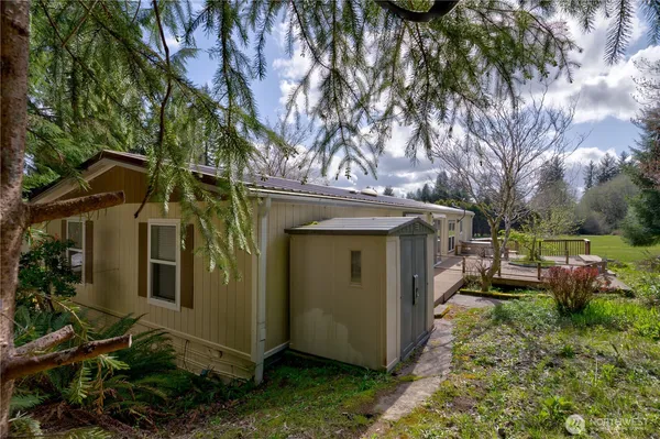 a view of a back yard of the house