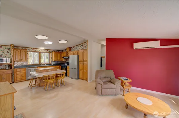 a living room with furniture and a table