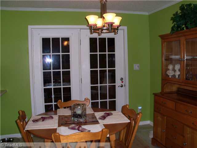 441 Golf Course Road Pilot Mountain, NC 27041 - Photo 5 of 16 Dining Room. Dining area with door leading to deck.