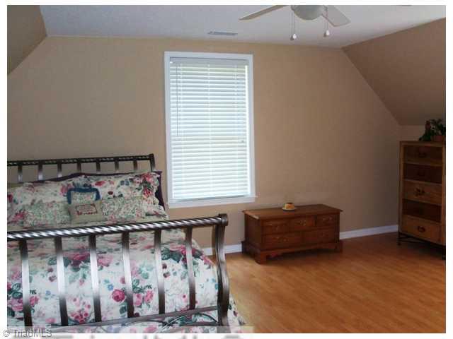441 Golf Course Road Pilot Mountain, NC 27041 - Photo 10 of 16 4th Bedroom. Spacious bedroom on upper bedroom.