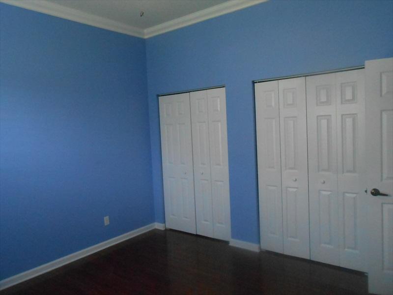 383 West Key Lime Square Southwest Vero Beach, FL 32968 - Photo 12 of 19 an empty room with wooden floor