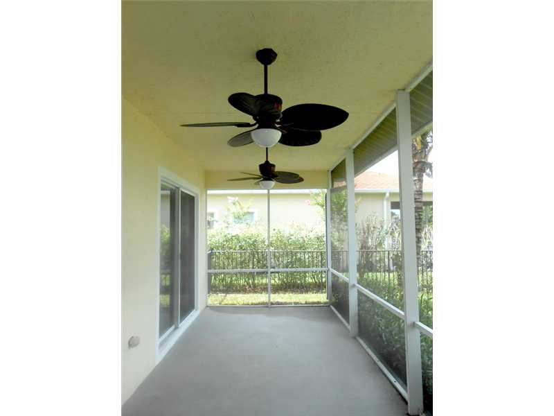 383 West Key Lime Square Southwest Vero Beach, FL 32968 - Photo 15 of 19 a view of hallway with a large window