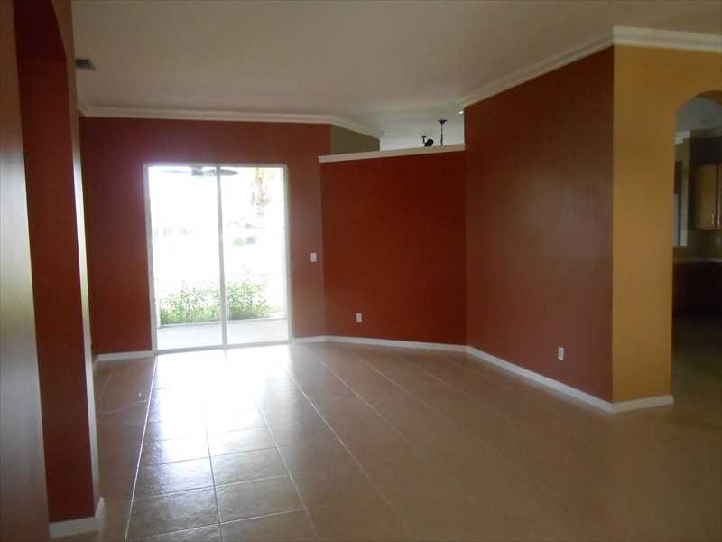 383 West Key Lime Square Southwest Vero Beach, FL 32968 - Photo 2 of 19 an empty room with windows and city view