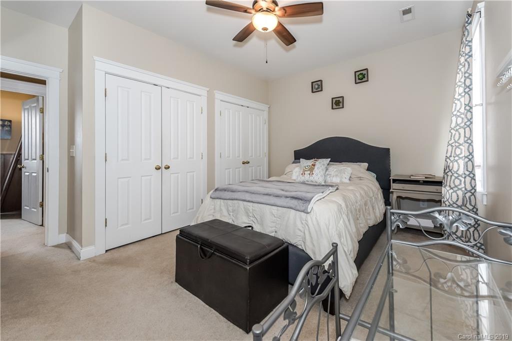 249 Faust Road Davidson, NC 28036 - Photo 28 of 36 a bedroom with a bed and window